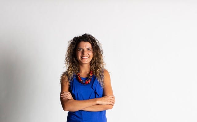 Filipa_A._headshot_blue Medium.jpeg